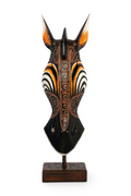 Standing giraffe mask sculpture with hand-painted swirl design – image 1